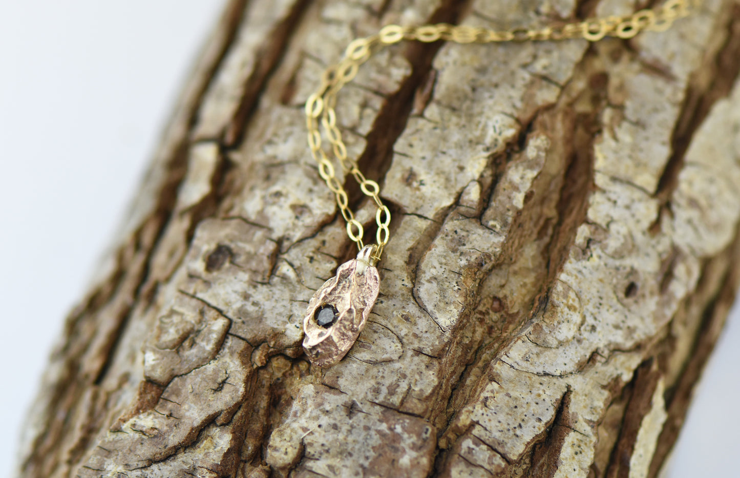 9ct Golden Bark Nugget with Black Diamond